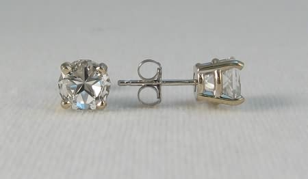 Earrings with white Mason County topaz 6mm Lone Star Cut stones.