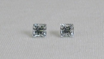 Matched pair of Mason County topaz princess cut.